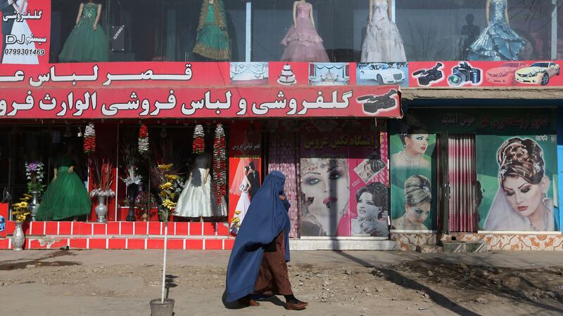Dozens of beauticians and makeup artists gathered in the capital Kabul to protest against the ban (Rahmat Gul/AP)