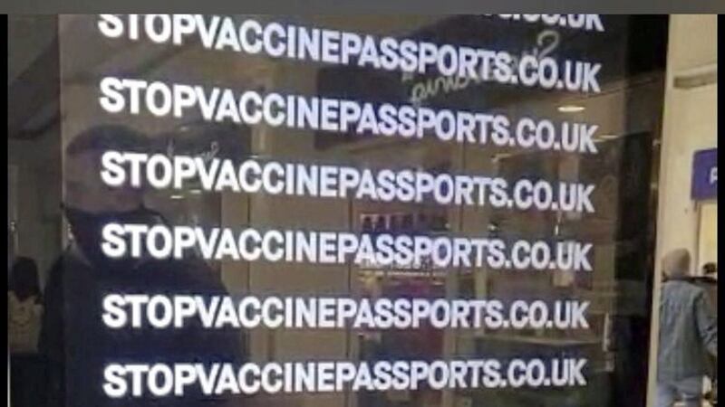 One of the Big Brother Watch adverts attacking plans for Covid vaccine passports that were displayed in Belfast shopping centres during the weekend. 