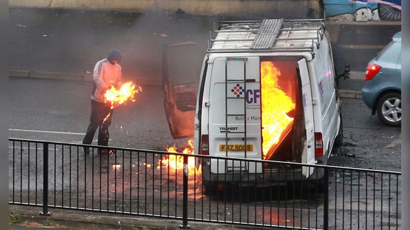 &nbsp;A youth burns a van on the Bogside in Derry on Tuesday night. Picture by Margaret McLaughlin