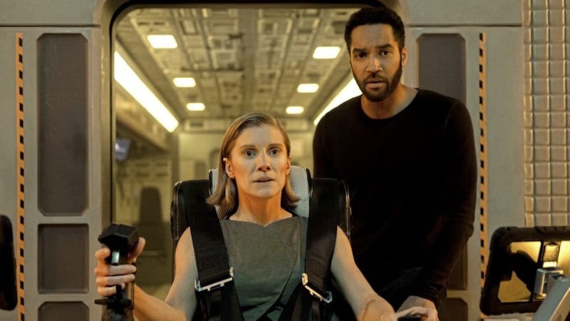 Katee Sackhoff as Niko Breckinridge and Samuel Anderson as William in Another Life - Season 2 