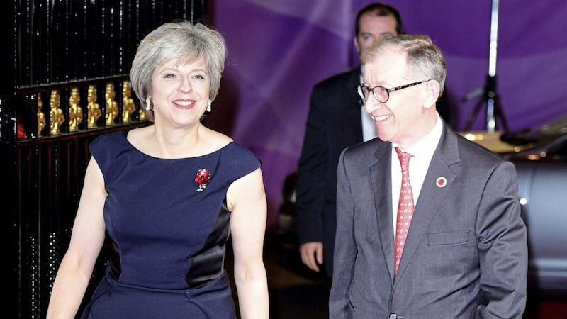 British Prime Minister Theresa May has revealed her secret weapon when she goes shopping - her husband Philip. Picture by Ian West, Press Association