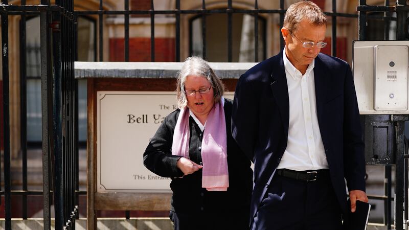Auriol Grey, who shouted and waved at a cyclist causing her to fall into the path of an oncoming car, leaving the Royal Courts of Justice in London