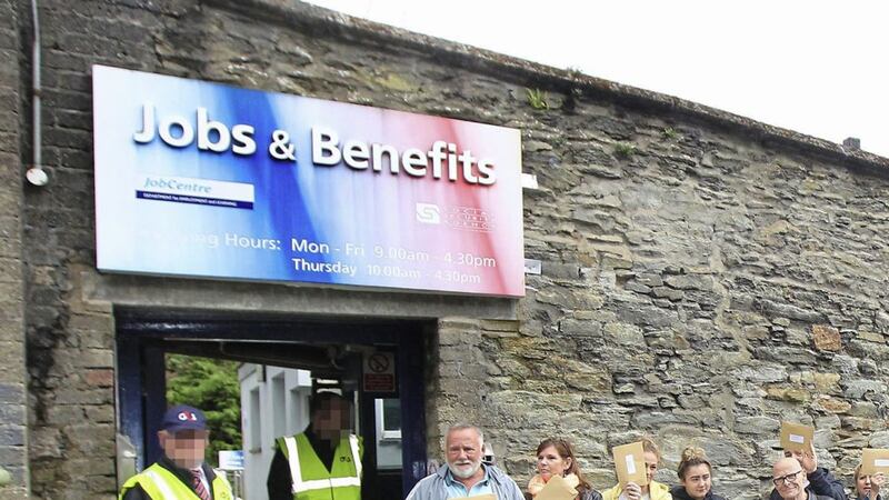 Welfare rights campaigners held a protest outside a benefits office in Derry. Picture by Margaret McLaughlin 