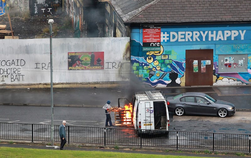 A burning van in Derry's Bogside. Picture by Margaret McLaughlin