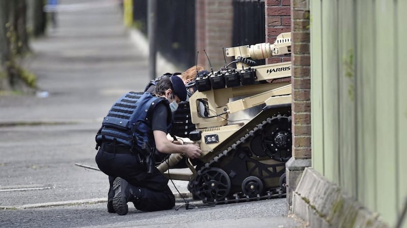 Police and bomb disposal experts at the scene of a security alert at Ormeau Golf Club in Belfast. Picture by Colm Lenaghan, Pacemaker 