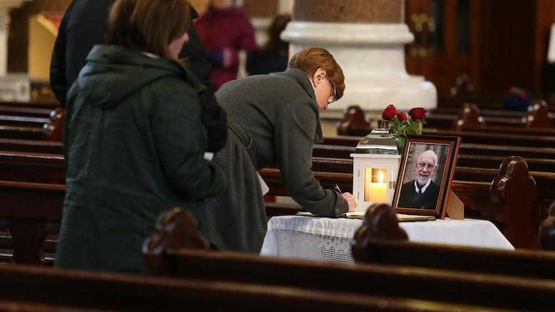 Tributes being left to Redemptorist priest Fr Gerry Reynolds at Clonard Monastery yesterday. Picture by Mal McCann. 