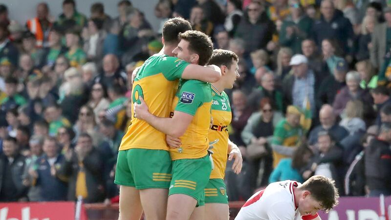 Daire Ó Baoill celebrates with Michael Langan at the final whistle in Donegal's win over Tyrone. Picture: Margaret McLaughlin