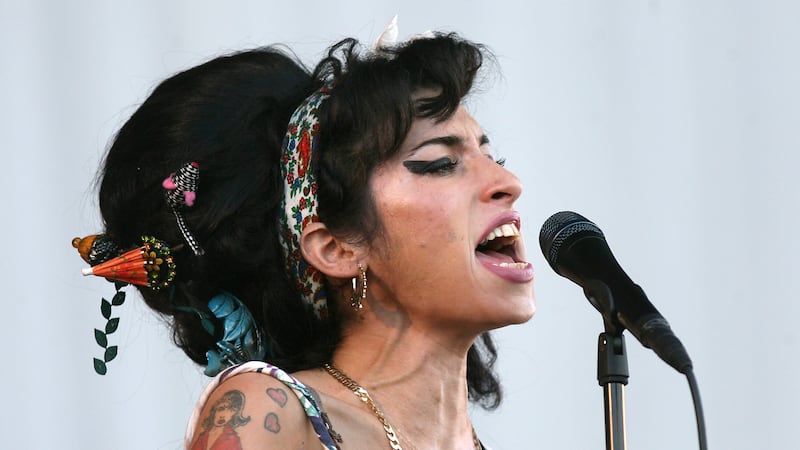 Amy Winehouse performing in 2008 (Niall Carson/PA)