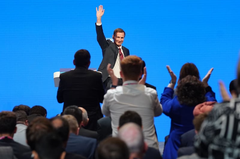 Chancellor of the Exchequer Jeremy Hunt delivers a speech during the Conservative Party annual conference at the Manchester Central convention complex 