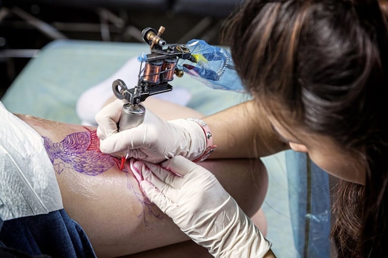 Tattoo parlours are to reopen next month as part of the further easing of lockdown