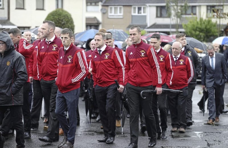 Members of Harryville Homers FC also attended yesterday&#39;s funeral service Picture By Hugh Russell. 