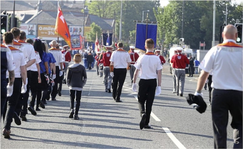 An Orange Order parade through Ardoyne passed off peacefully yesterday. Picture by Hugh Russell. 