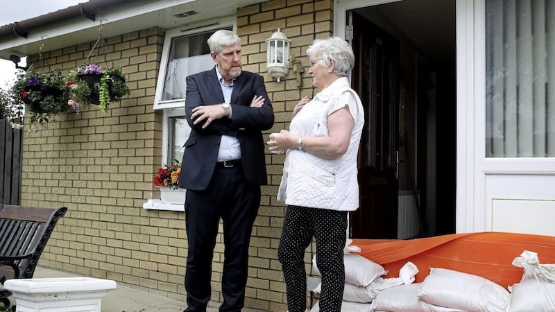 Greta Mooney, whose home was flooded, was one of a number of residents who met Infrastructure Minister John O&#39;Dowd during his visit to Eglinton. 