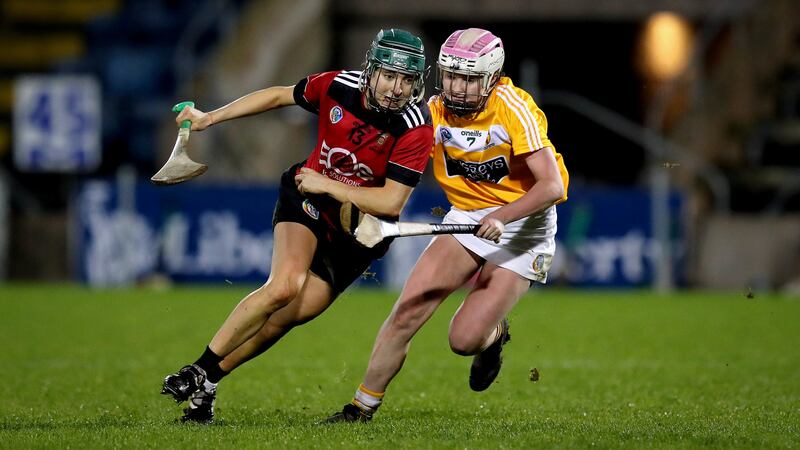 Down's Niamh Mallon (left) in action against Antrim in the Liberty Insurance All-Ireland Intermediate Camogie Final.&nbsp;