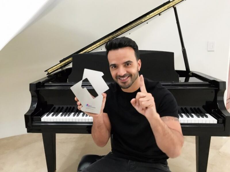 Luis Fonsi in Miami with his Official Number 1 Award for Despacito 
