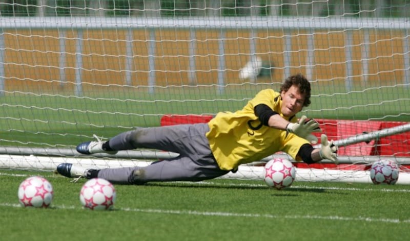 Former Arsenal goalkeeper Jens Lehmann practices saving penalties