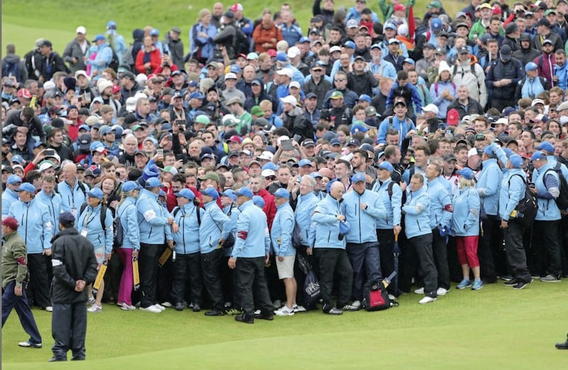               Large crowds gather around the 18th green during day four of The Open Championship 2019 at Royal Portrush Golf Club. PRESS ASSOCIATION Photo. Picture date: Sunday July 21, 2019. See PA story GOLF Open. Photo credit should read: Richard Sellers/PA Wire. RESTRICTIONS: Editorial use only. No commercial use. Still image use only. The Open Championship logo and clear link to The Open website (TheOpen.com) to be included on website publishing.             
