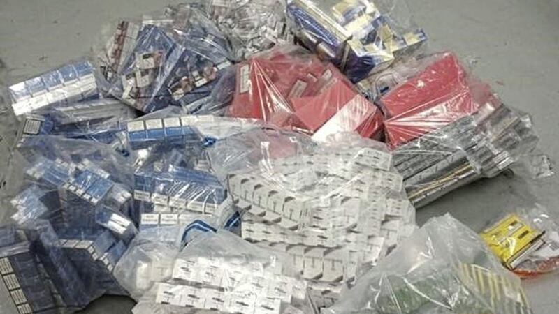 Suspected class A drugs, thousands of cigarettes and counterfeit items were found by police 