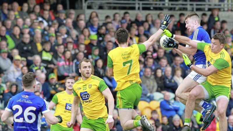 Donegal&#39;s Ryan McHugh and Paul Brennan with Oisin Kiernan of Cavan during the Ulster Senior Football Championship preliminary round at Ballybofey. Picture by Margaret McLaughlin. 