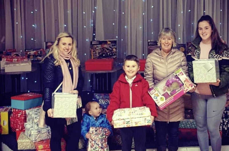 Following their success Halloween foodbank campaign, members of Patrick Sarsfield&rsquo;s, Belfast donated almost 100 shoeboxes filled with toiletries, gloves, socks and presents to Lenadoon women&rsquo;s group and St Vincent de Paul, to be distributed over the Christmas period 