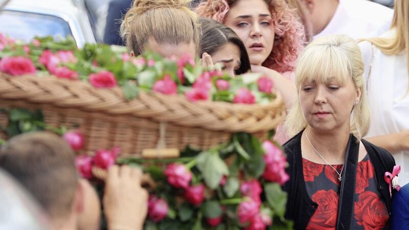 Lisa Roussos looks on as the coffin of her daughter Saffie Roussos, who died in the Manchester Arena bombing, arrives at Manchester Cathedral for her funeral service Picture: Danny Lawson/PA 