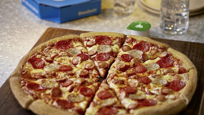 Pizza chain Domino&#39;s saw its slice of the UK takeaway market rise to 7.8 per cent in the first quarter, up from 6.4 per cent a year earlier 