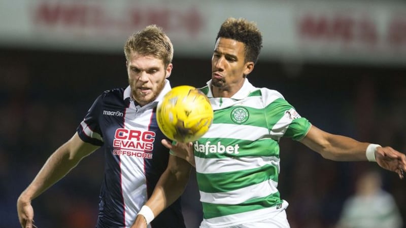 Ross County's Marcus Fraser (left) and Celtic's Scott Sinclair (right) battle for the ball during the Ladbrokes Scottish Premiership match at the Global Energy Stadium&nbsp;