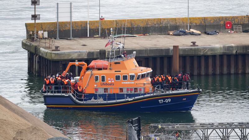 More than 400 migrants arrived in the UK on the day five people including a child died while trying to cross the Channel
