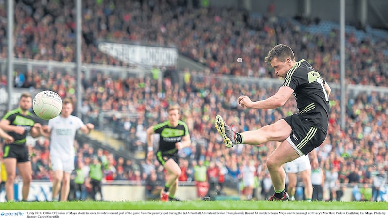 &nbsp; Cillian O&rsquo;Connor sidefoots to the net from the penalty spot to give Mayo the lead after Aidan O&rsquo;Shea had won a disputed penalty<br />Picture by Sportsfile