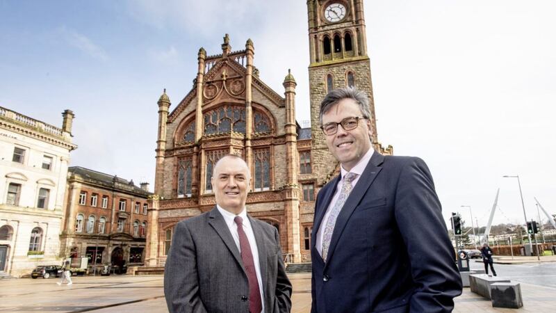 Alastair Hamilton (Invest NI) is joined by Kieran Hegarty, president of Terex Materials Processing, at the Guildhall in Derry to announce the creation of 100 jobs at Campsie. Photo: Andrew Towe (Parkway Photography) 