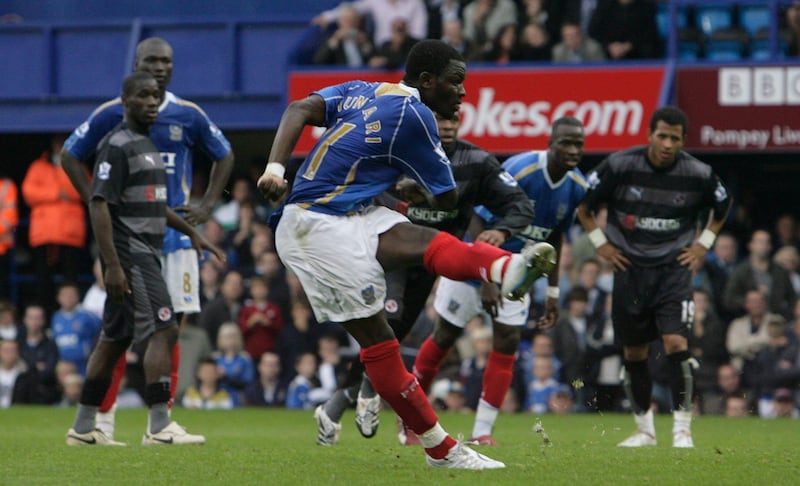 Sulley Muntari takes a penalty for Portsmouth against Reading