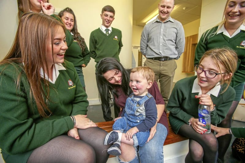 Some of the pupils from Coaliste Feirste who registered to became organ donors in support of little Daithi Mac Gabhann who needs a heart transplant Picture Mal McCann. 