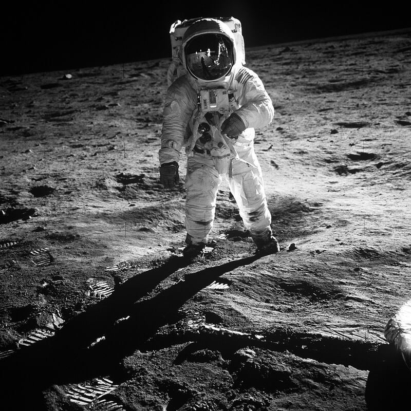 Neil Armstrong taking mankind's first ever steps on the moon.