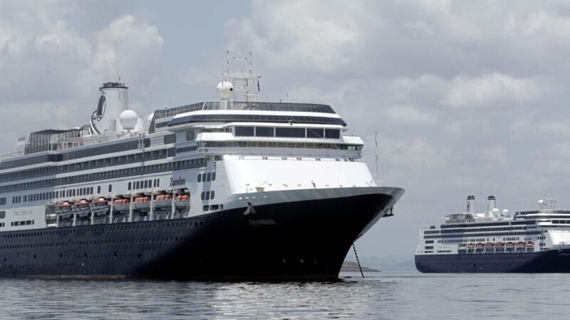 The Zaandam cruise ship, left, is sailing towards Florida. Picture by AP Photo/Arnulfo Franco 