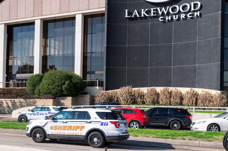 Emergency vehicles line up outside Lakewood Church (Kirk Sides/AP)