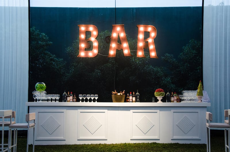 Wedding venue with the bar is open sign