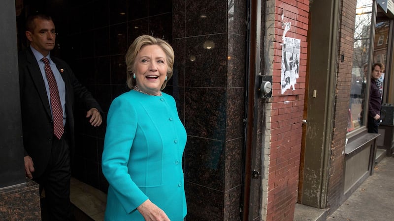 Democratic presidential candidate Hillary Clinton steps outside after greeting patrons at Cedar Park Cafe in Philadelphia. Picture by Andrew Harnik, Associated Press&nbsp;