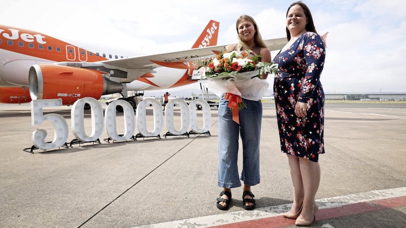 EasyJet&#39;s 500,000th passenger at Belfast City Airport, Abby Wood, celebrates with Ellie McGimpsey, aviation development manager at the airport. Picture: Kelvin Boyes/PressEye 