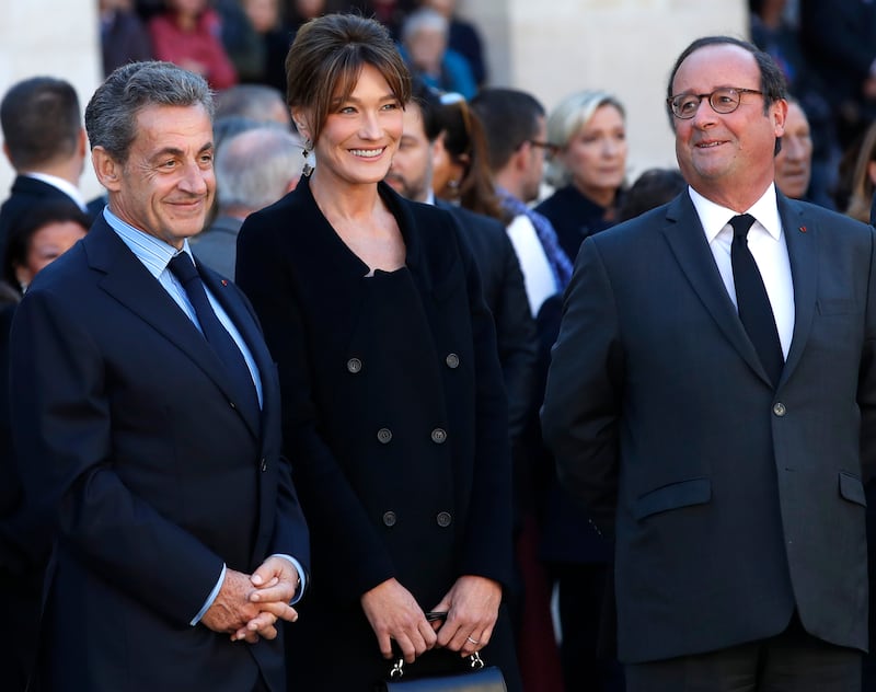 Nicolas Sarkozy, left, his wife Carla Bruni Sarkozy and Francois Hollande