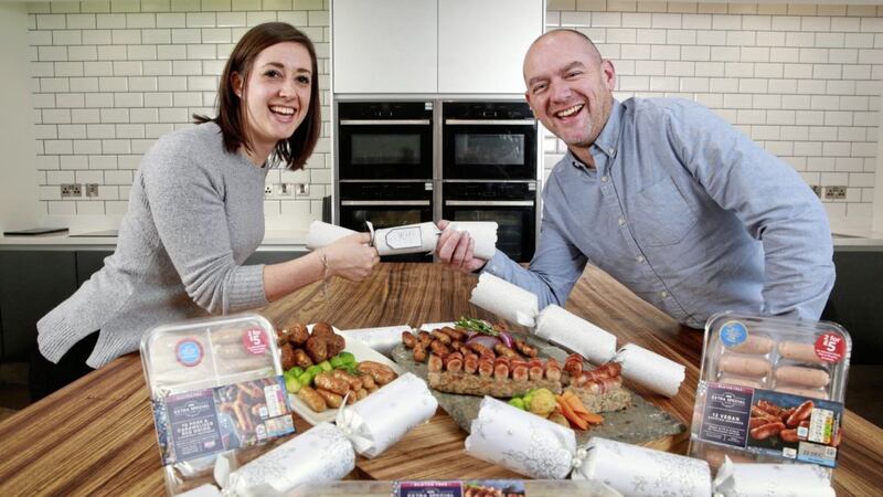 Celebrating the festive food contract are Finnebrogue&#39;s John Cowen and Emma Swan from Asda 