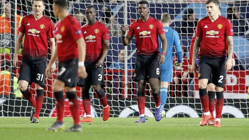 Manchester United players stand dejected after conceding the first goal during Tuesday evening&#39;s defeat by PSG Picture by Martin Rickett/PA Wire. 