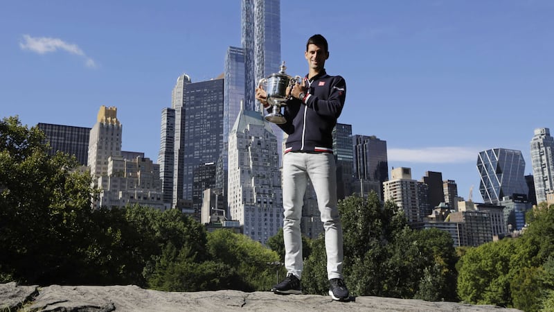 Serbia's Novak Djokovic with the US Open trophy in New York's Central Park on Monday<br />Picture: AP