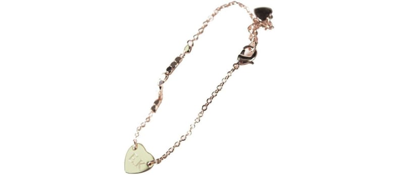 Personalised Rose Gold Bracelet With Heart Pendant, &pound;10.19 (was &pound;16.99), available from Getting Personal