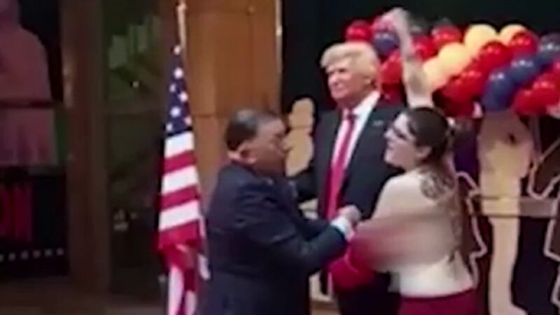 Topless protester interrupts Donald Trump waxwork unveiling in Madrid