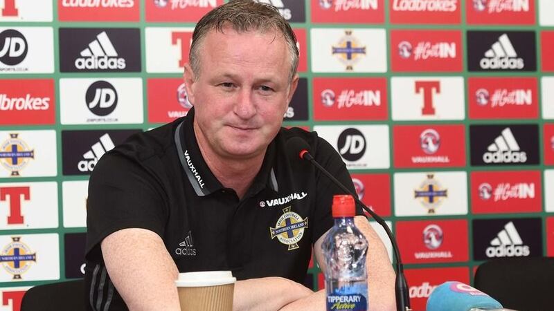 Michael O'Neill will be staying with Northern Ireland