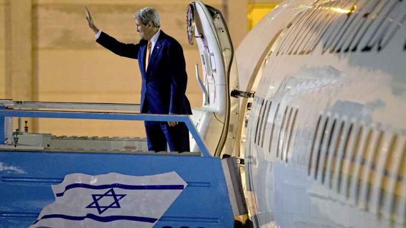 US Secretary of State John Kerry waves as he boards the plane on departure from Israel in 2015 