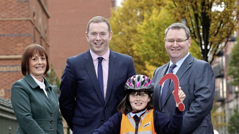 Infrastructure minister Chris Hazzard and Megan McKeown launch the NI Primary School Road Safety Quiz. They are joined by Joan Kinnaird, pictured left, from event organisers Road Safe NI and Jonathan McKeown, pictured right, from sponsors CRASH Services 