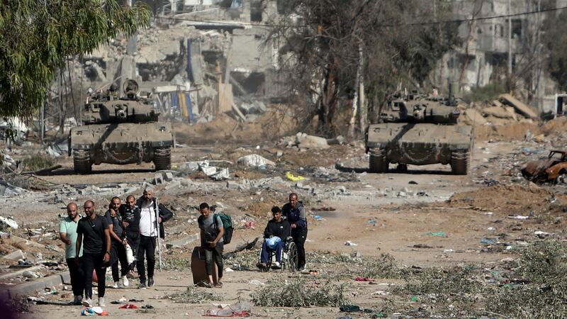 Palestinians flee from northern Gaza (Mohammed Dahman/AP)