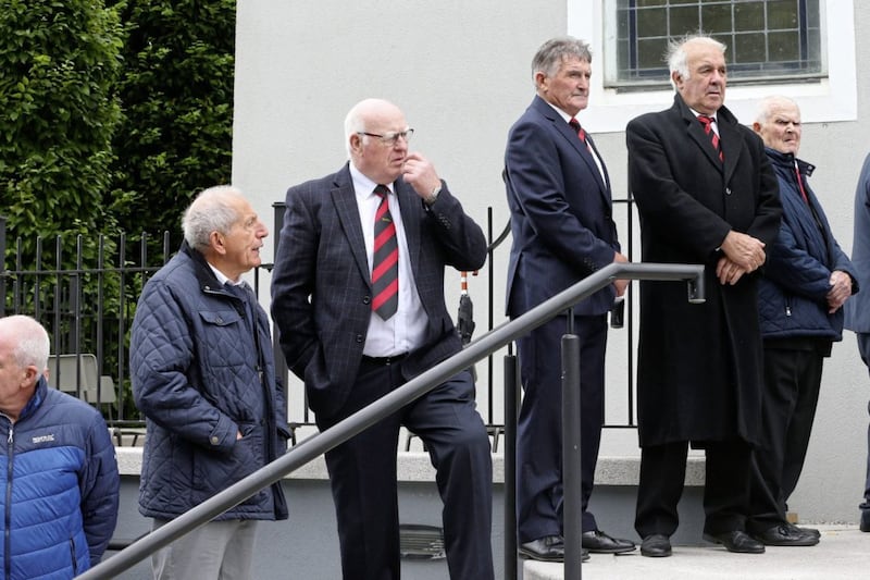 Some of the former down 1960s players form a guard of honor at the funeral of Down GAA legend James McCartan at St Mary's Church, Burren. Picture by Mal McCann.