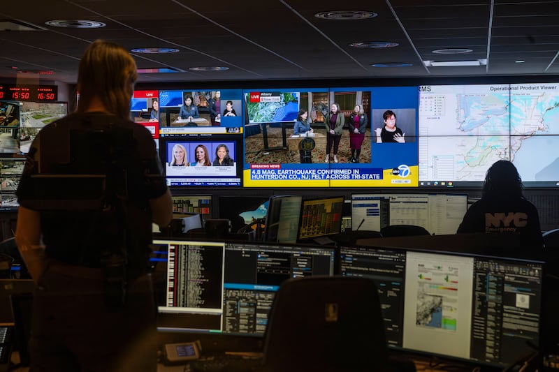 The command centre at the New York City emergency management department sprung into action (AP Photo/Brittainy Newman)